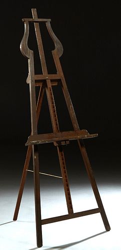 French Carved Walnut Adjustable Artist's easel, early 20th c., H.- 72 in., W.- 25 1/4 in., D.- 26 in.