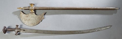Two Medieval Style Steel Weapons, 20th c., one a battle axe, the other a curved sword, Sword- H.- 34 1/4 in. Provenance: Palmira, the Estate of Sarkis