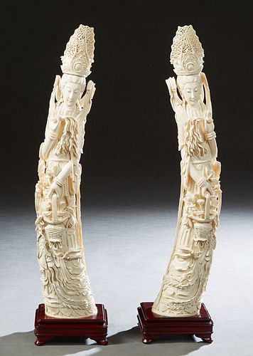 Pair of Large Chinese Carved Bone Figures, 20th c., of Kwan Yins, with ornate pierced crowns, signed on the underside, H.- 22 1/8 in., W.- 4 1/2 in., 