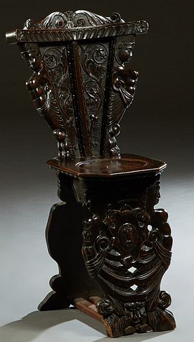 Continental Carved Mahogany Hall Chair, 19th c., the arched scrolled crest over tapered figural carved back to an octagonal seat, on figural carved su