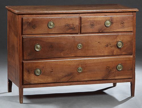 French Louis XVI Style Carved Walnut Commode, 20th c., the rectangular top over two frieze drawers above two deep drawers, on tapered square legs, H.-