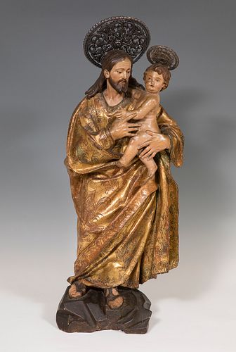 Andalusian school; mid-eighteenth century. 
"Saint Joseph with Child". 
Carved and polychrome wood.