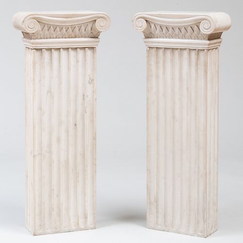 Pair of Marble Ionic Form Pedestals