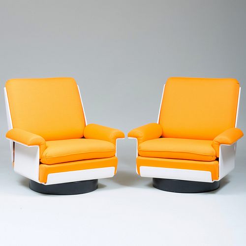 Pair of Airborne White Painted Swivel Lounge Chairs