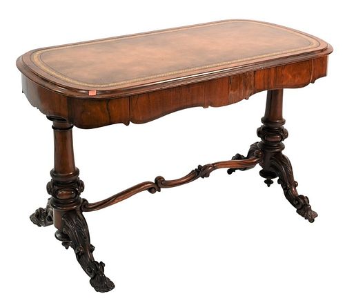 George IV Rosewood Writing Table, having inset leather top, two drawers on carved pedestal bases, scroll stretcher, circa 1850, height 28 inches, top 