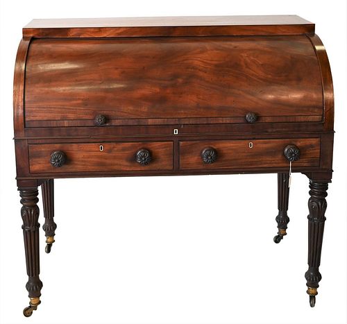 George III Mahogany Cylinder Roll Top Desk, having pull out leather writing surface over two drawers, on turned and fluted legs ending in brass castor