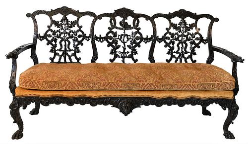 Chippendale Style Triple Chair Back Settee, having piece carved oak leaves and bird, having carved bird handrests, custom upholstery cushion center ca