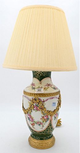 French Porcelain Vase, having painted flowers, mounted with gilt bronze swag on bronze base, made into a table lamp, poorly repaired top, height of va