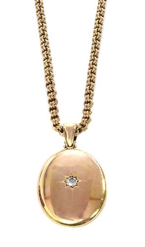 A Victorian gold diamond set locket and chain,