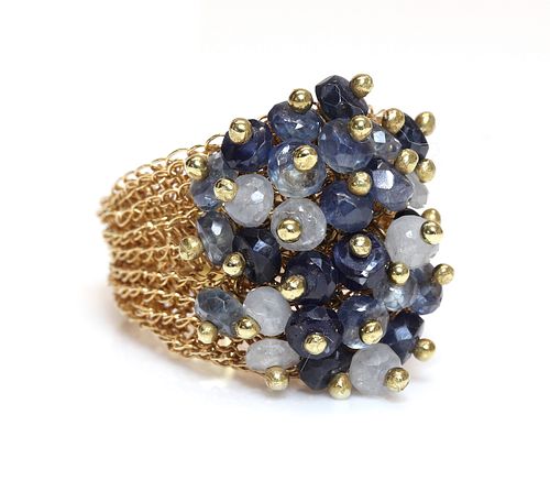 An 18ct gold sapphire cluster ring, by Rina Tairo,