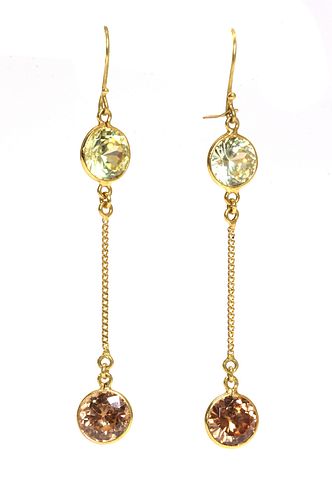 A pair of zircon drop earrings,