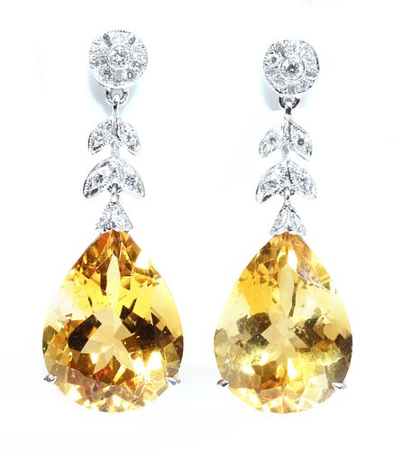 A pair of citrine and diamond drop earrings,
