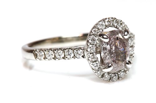 A white gold fancy brownish purplish pink diamond and diamond halo cluster ring,