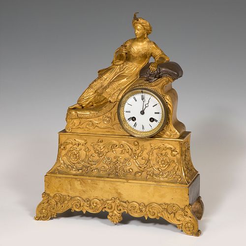 Clock; France, circa 1840. 
Gilded bronze,