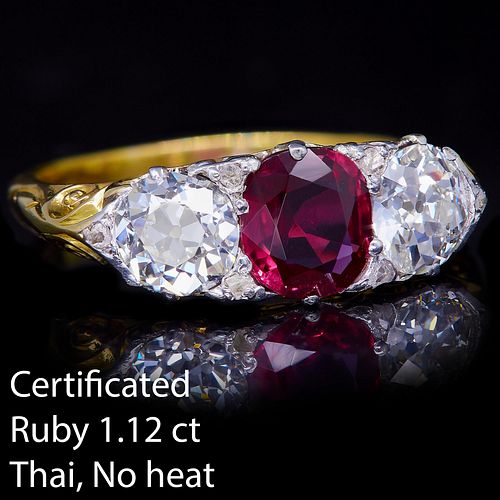 IMPORTANT 3-STONE RUBY AND DIAMOND RING