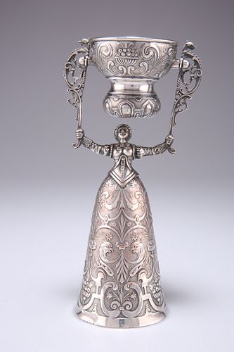 A 19TH CENTURY CONTINENTAL SILVER-PLATED WAGER CUP, of typical form. 19.5cm