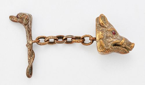 A NOVELTY HUNTING CLOAK CLASP, modelled as a boar's head chain-linked to a 