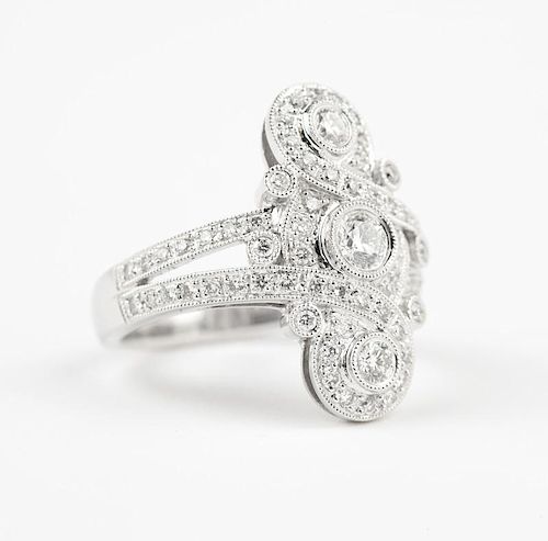 A diamond and white gold antique-style ring