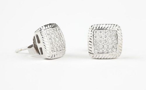 A pair of diamond and white gold square studs