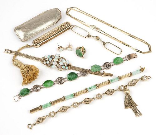 A large collection of gem, jade and gold jewelry