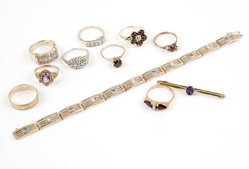 A group of gem-set and gold jewelry