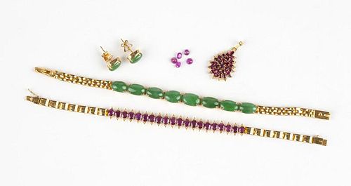 A collection of ruby, jade and gold jewelry