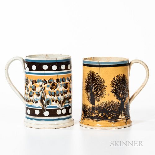 Two Slip-decorated Quart Mugs