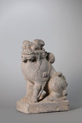 A Carved Stone Figure of Lion