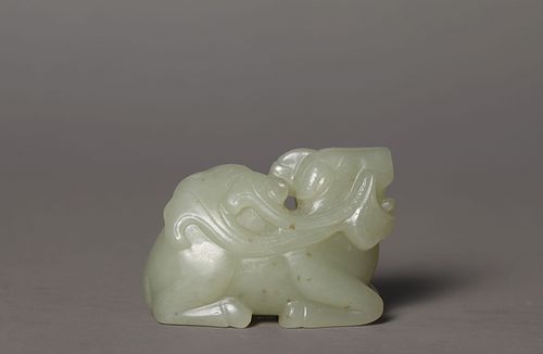 A Carved White Jade Mythical Beast and Lingzhi Ornament