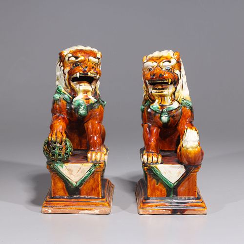 Pair of Chinese Sancai Glazed Ceramic Foo Lions