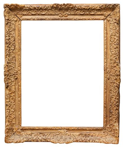Regency period frame. France, early 18th century. 
Carved wood. With traces of gilding.