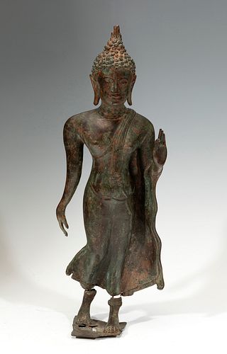 Buddha figure; Indonesia, Java, VII-X centuries. 
Bronze, with traces of polychrome.