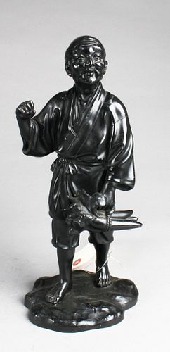 A Metal Old Man Figurine