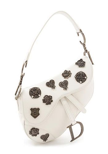 * A Christian Dior White Calfskin Saddle Handbag, 10" x 8" x 2.5".
