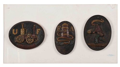 Three Cast Iron Fire Plaques Mounted on Lucite