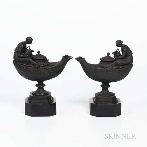 Two Wedgwood Black Basalt Oil Lamps, England, 19th century, oval with fluted neck, oak leaf border and acanthus and bellflowers to lower body, each wi