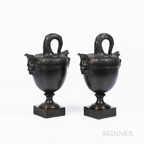 Two Non-period, Non Factory Black Basalt Stella Fishtail Ewers, England, each modeled with scales to fish tail handles and top, mask below the spout a