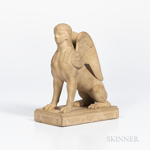 Wedgwood Caneware Sphinx, England, late 18th/early 19th century, modeled seated atop a rectangular base set with Egyptian motifs in relief, impressed 