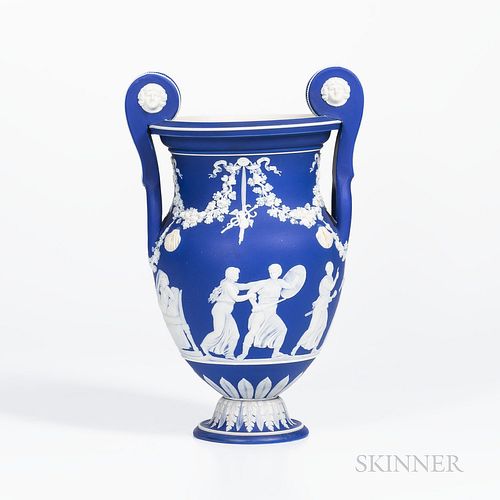 Wedgwood Dark Blue Jasper Dip Volute Krater Urn, England, early 19th century, applied white relief with masked handles, classical figures below fruiti