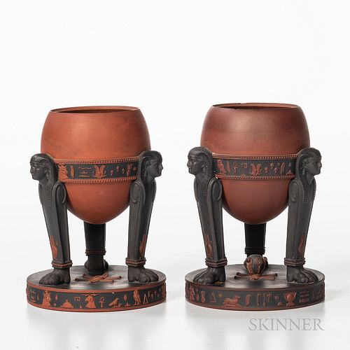 Pair of Wedgwood Rosso Antico Egyptian Tripod Vases, England, early 19th century, applied black basalt sphinx-form legs and black washed band and base
