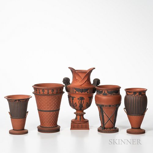 Five Wedgwood Rosso Antico Egyptian Vases, England, 19th century, three with black basalt relief, an engine-turned basketweave, ht. 8 3/4; a vase with