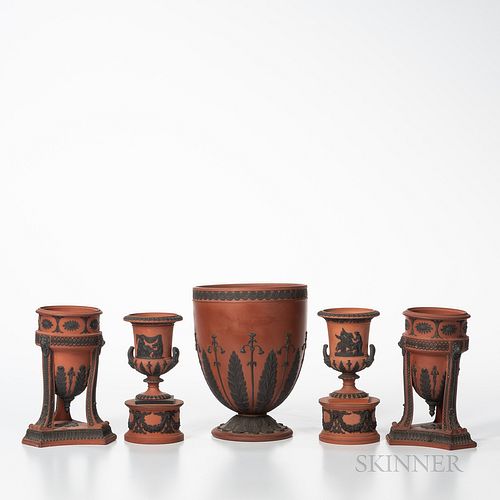 Five Wedgwood Rosso Antico Items, England, 19th century, each with black basalt relief, a pair of tripod base incense burners, ht. 6 3/4; two similar 