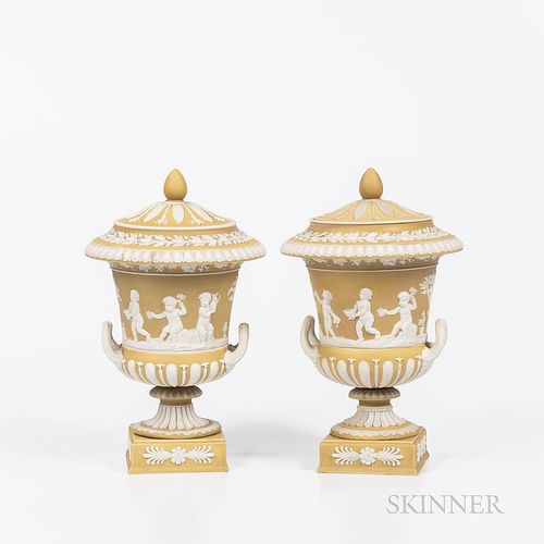 Pair of Wedgwood Yellow Jasper Dip Campana-shape Vases and Covers, England, 19th century, applied white classical figures in relief, impressed marks, 