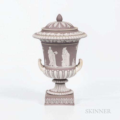 Wedgwood Lilac Jasper Dip Campana-shape Vase and Cover, England, applied white relief with classical figures bordered with gadroons, fruiting grapevin