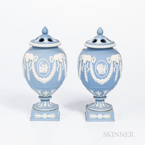 Pair of Wedgwood Solid Light Blue Jasper Potpourri Vases and Covers, England, early 20th century, applied white classical medallions in relief within 