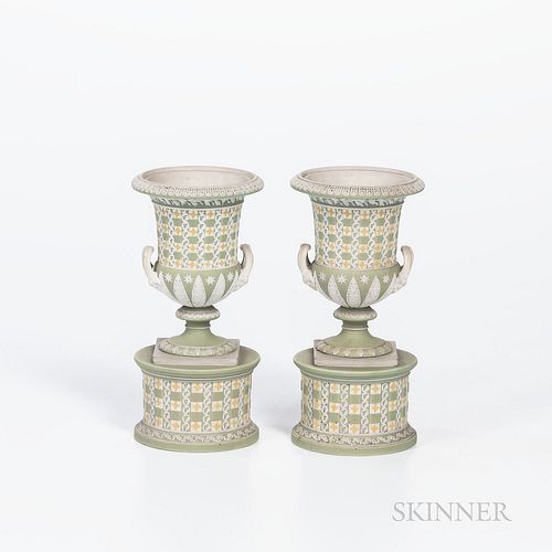 Pair of Wedgwood Tricolor Diceware Jasper Dip Urns, England, 19th century, applied white relief to a green ground with yellow quatrefoils, impressed m