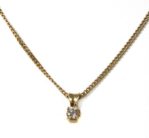 A 9ct gold single stone diamond pendant,