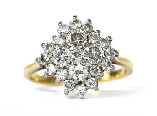 A gold diamond quatrefoil cluster ring,