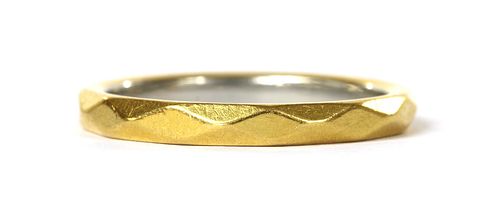 A 22ct gold faceted wedding ring,