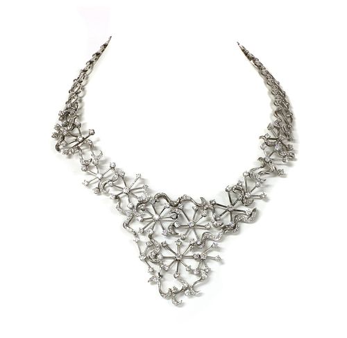 A white gold diamond set collar,